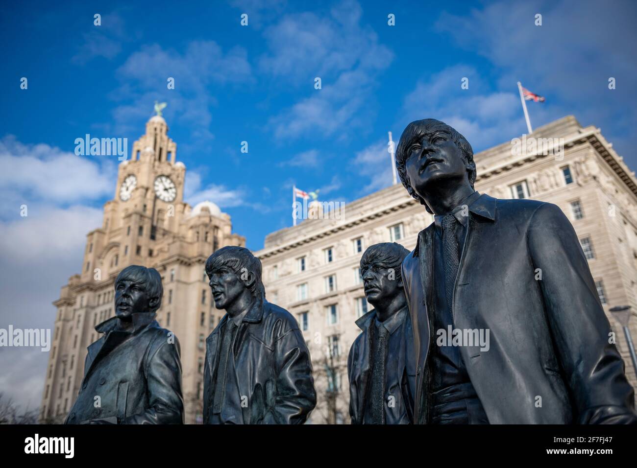 La statua in bronzo dei Beatles si trova sul lungomare di Liverpool, Liverpool, Merseyside, Inghilterra, Regno Unito, Europa Foto Stock