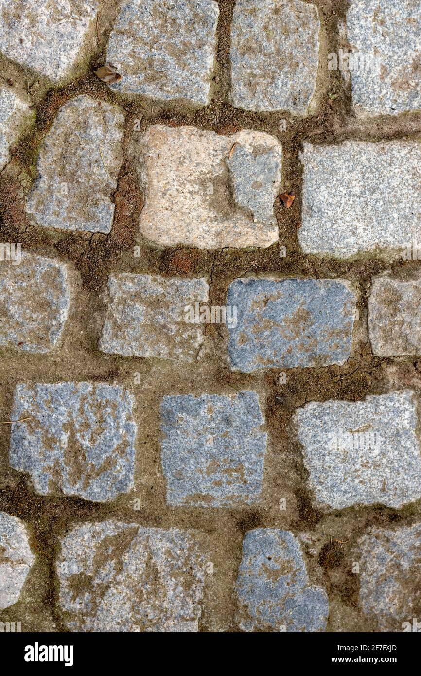 primo piano di pietre grigie per pavimentazione per sfondo Foto Stock