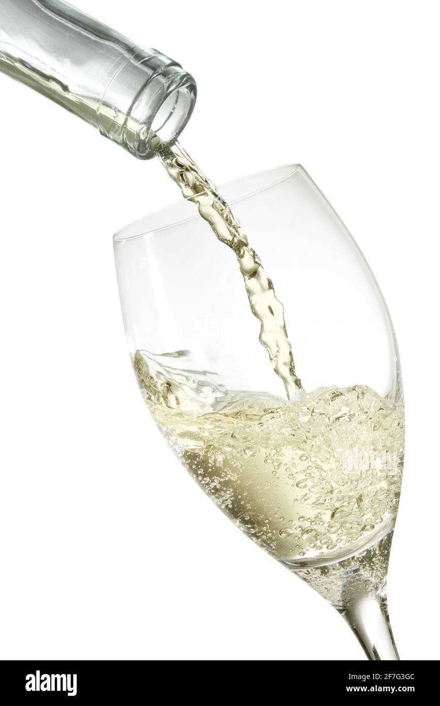 bottiglia di vino bianco in un bicchiere Foto Stock
