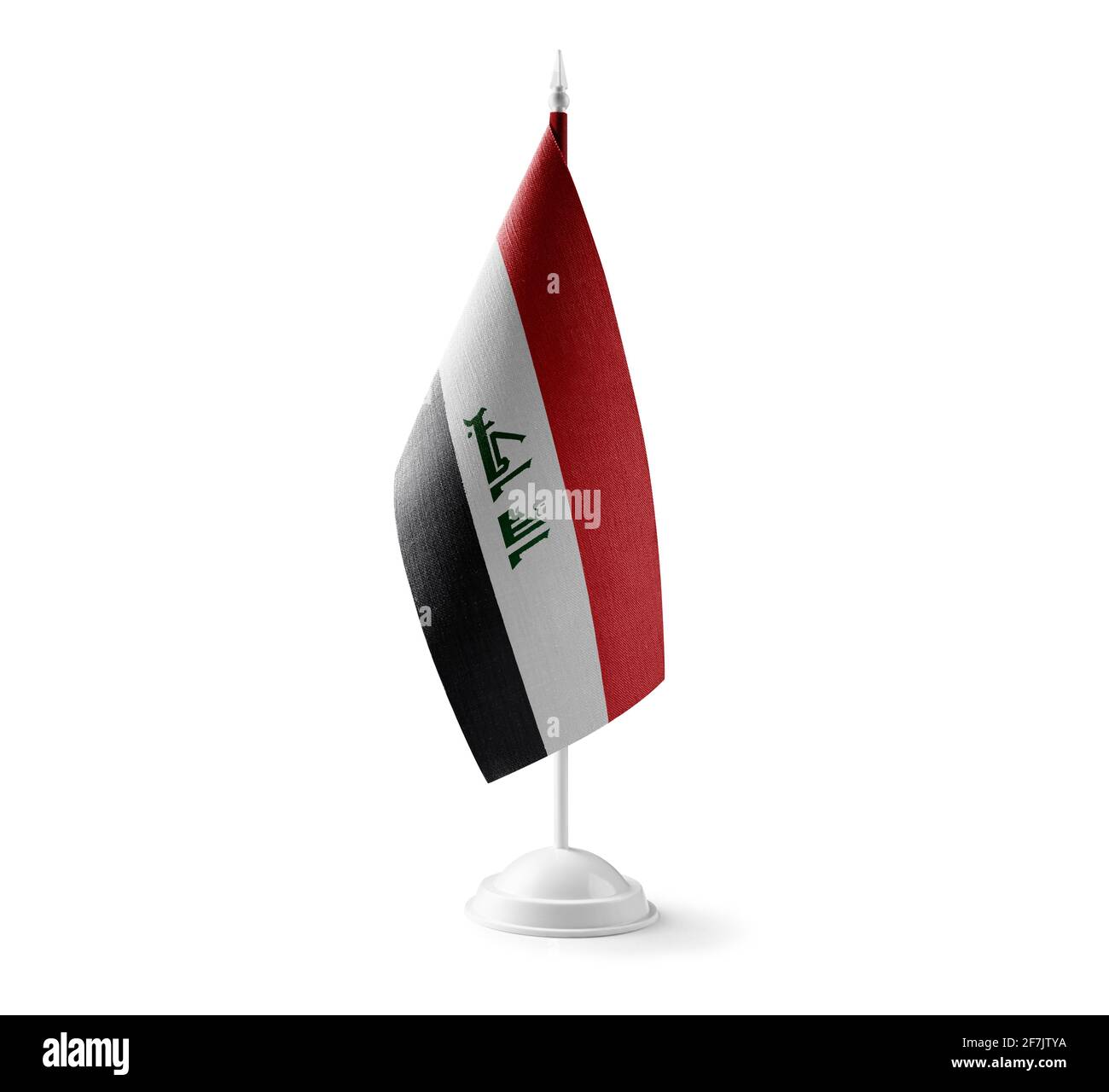 Piccola bandiera nazionale dell'Iraq su sfondo bianco Foto Stock