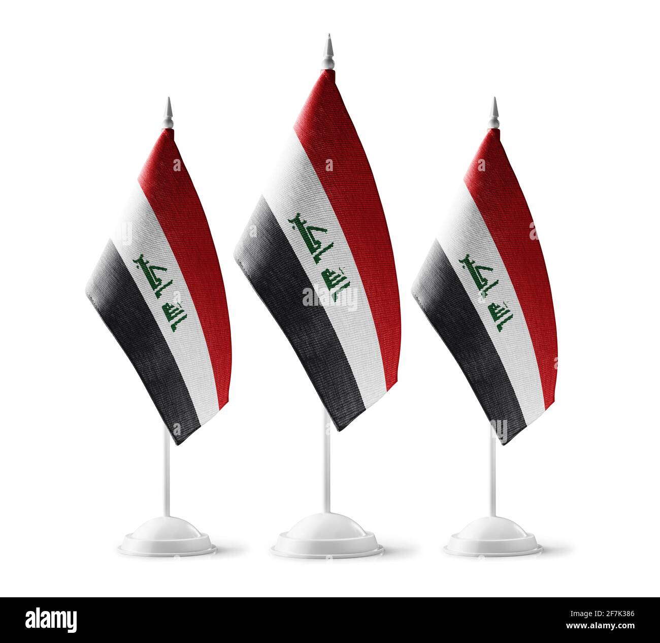 Piccole bandiere nazionali dell'Iraq su sfondo bianco Foto Stock
