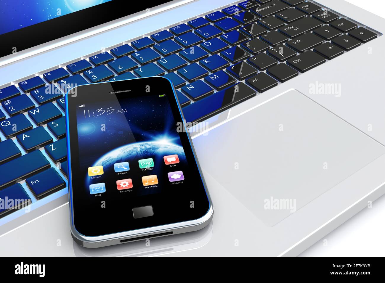 Smartphone con sfondo Space Dawn e app su uno schermo sdraiato sulla tastiera del computer portatile. La texture terrestre di questa immagine fornita dalla NASA. (http://visible Foto Stock