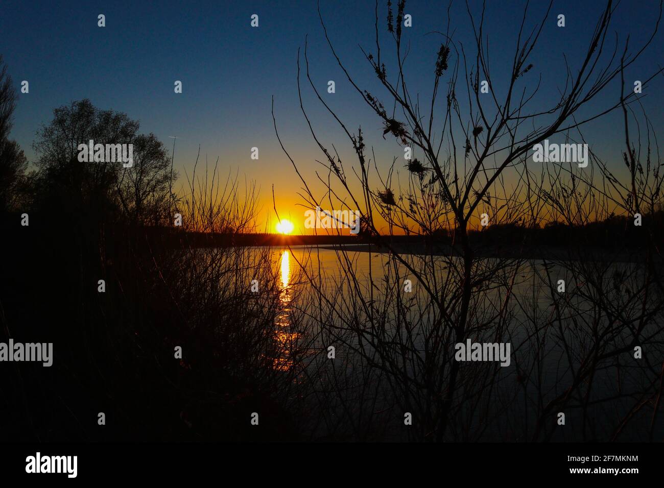 Tramonto sul po, Emilia Romagna. Italia Foto Stock
