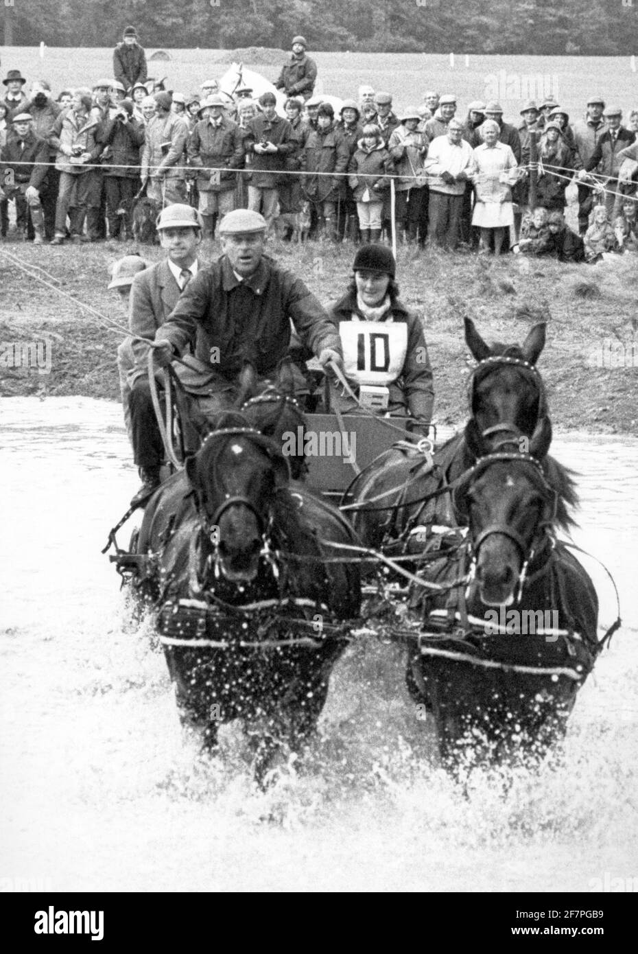 File foto datata 23/09/84 del Duca di Edimburgo che attraversa un ostacolo d'acqua durante il famoso Grouse National Carriage Driving Championships a Windsor. Philip era un sportivo completo con una particolare passione per la polo e la guida in carrozza. Data di emissione: Venerdì 9 aprile 2021. Foto Stock