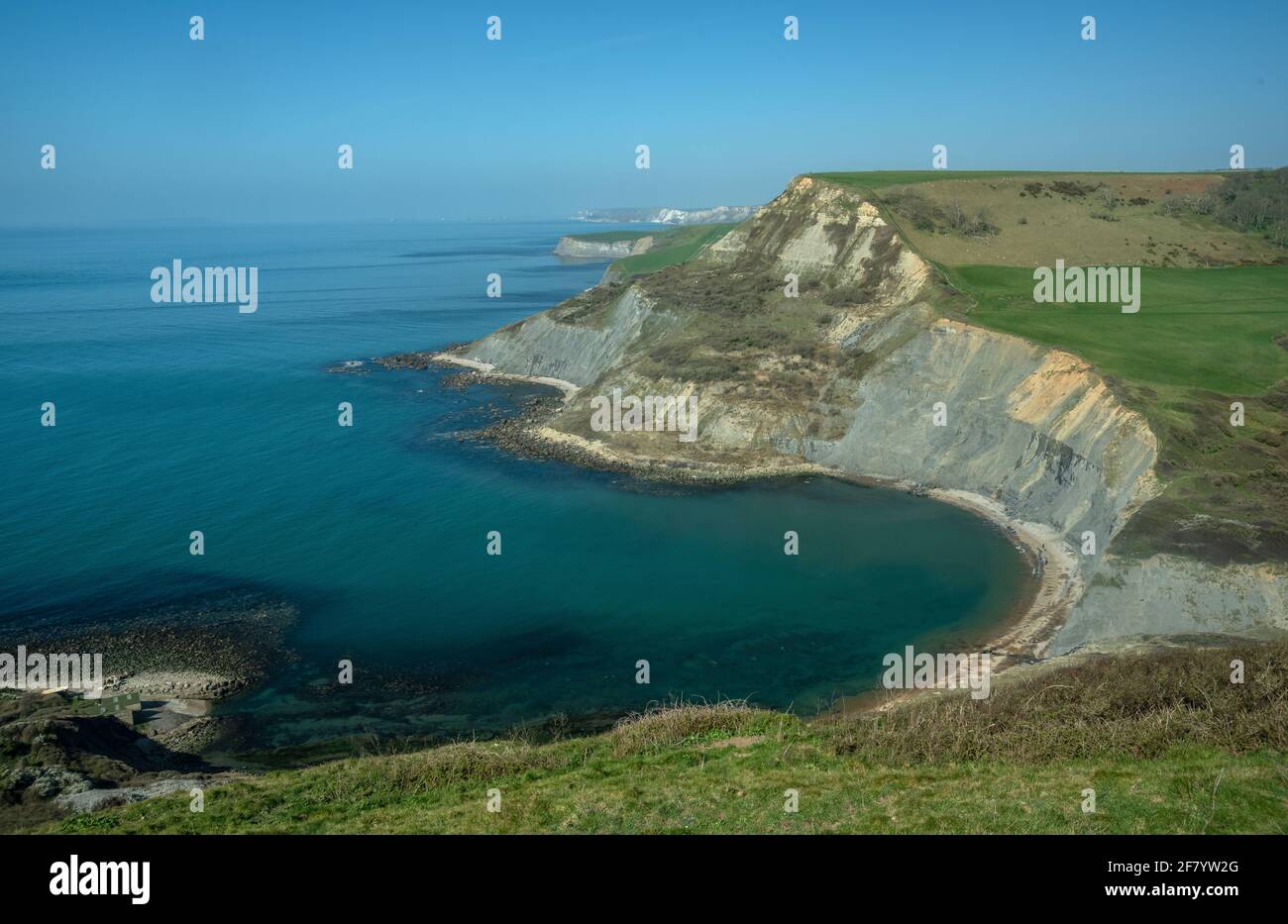 Dorset Jurassic costa, guardando a ovest su Chapman's Pool e Houns-tout scogliera verso Lulworth. Dorset. Foto Stock