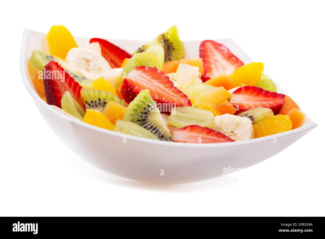 ciotola di insalata di frutta isolata su sfondo bianco Foto Stock