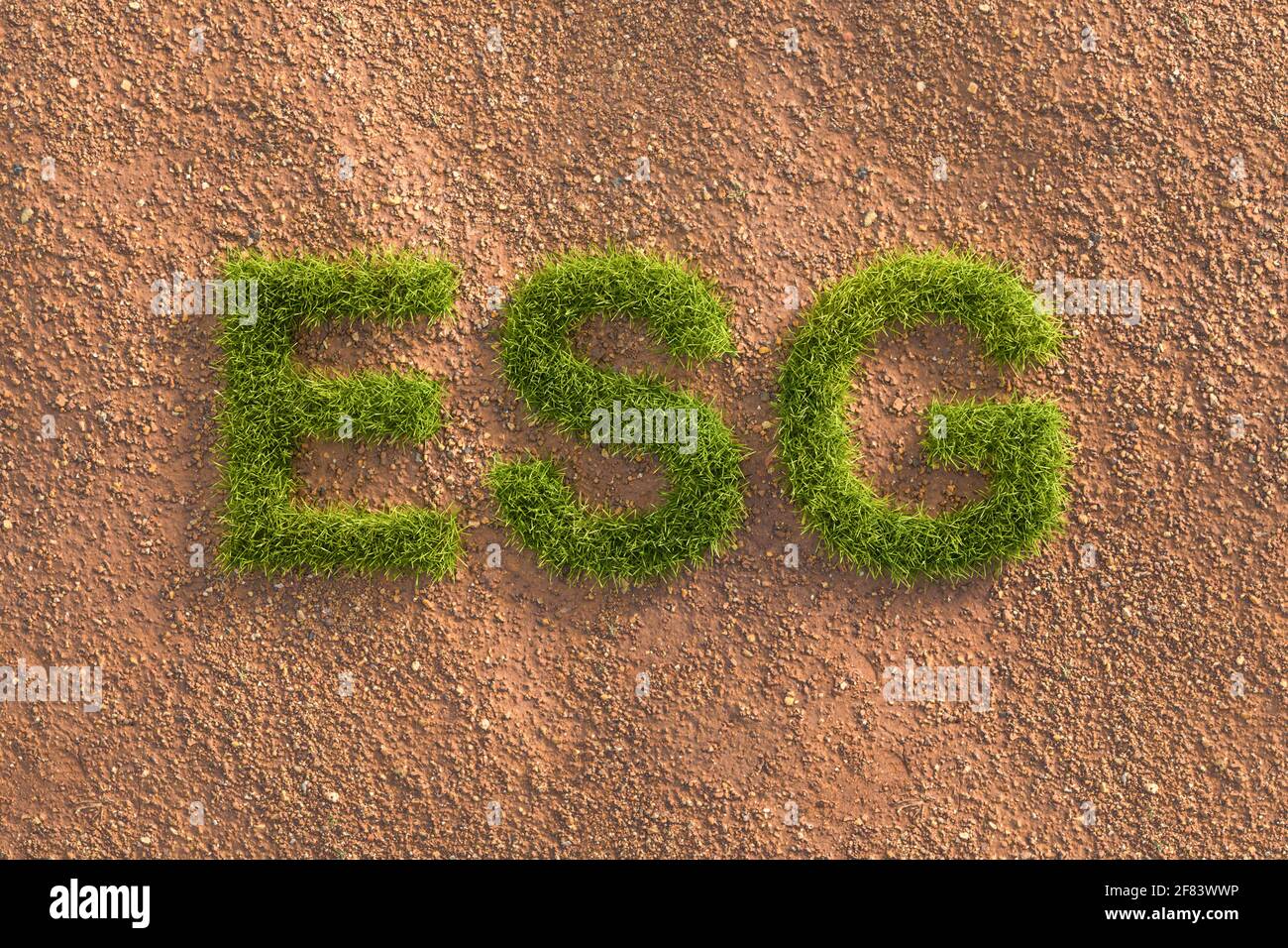 Verde erba lettere ESG in un paesaggio arido. Concetto per gli standard ESG (Environment Social Governance) nell'investimento. Foto Stock
