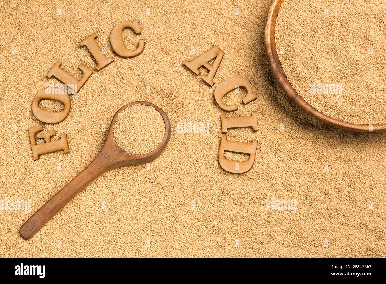 Semi di Amaranth in cucchiaio di legno - Amaranthus. Acido folico Foto Stock