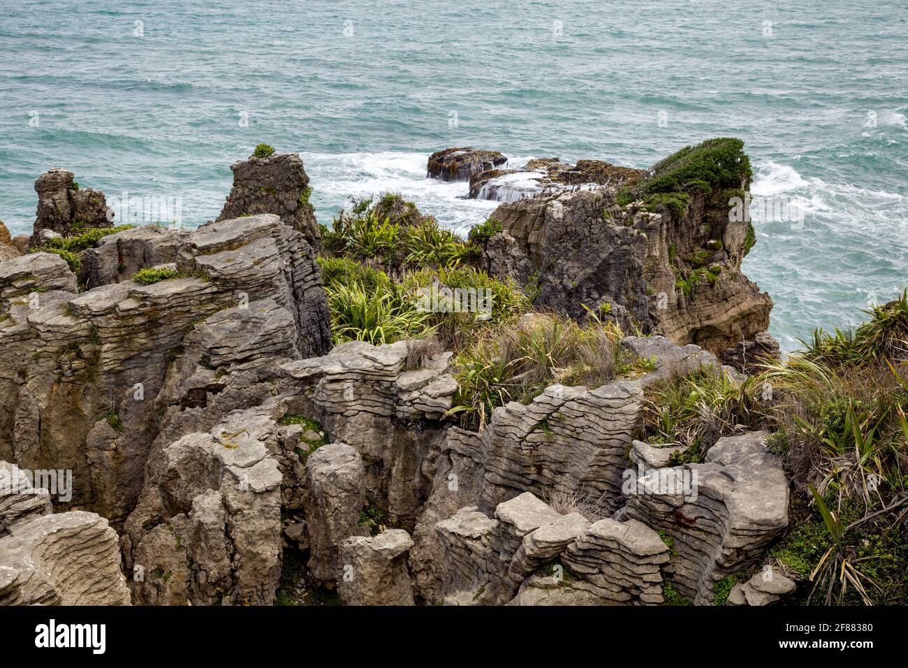 Rocce di pancake vicino Punakaiki in Nuova Zelanda Foto Stock
