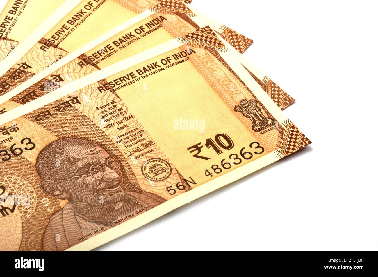 Nuova valuta indiana di 10 rupie nota su sfondo bianco isolato, valuta indiana, rupia, rupia indiana, denaro indiano Foto Stock