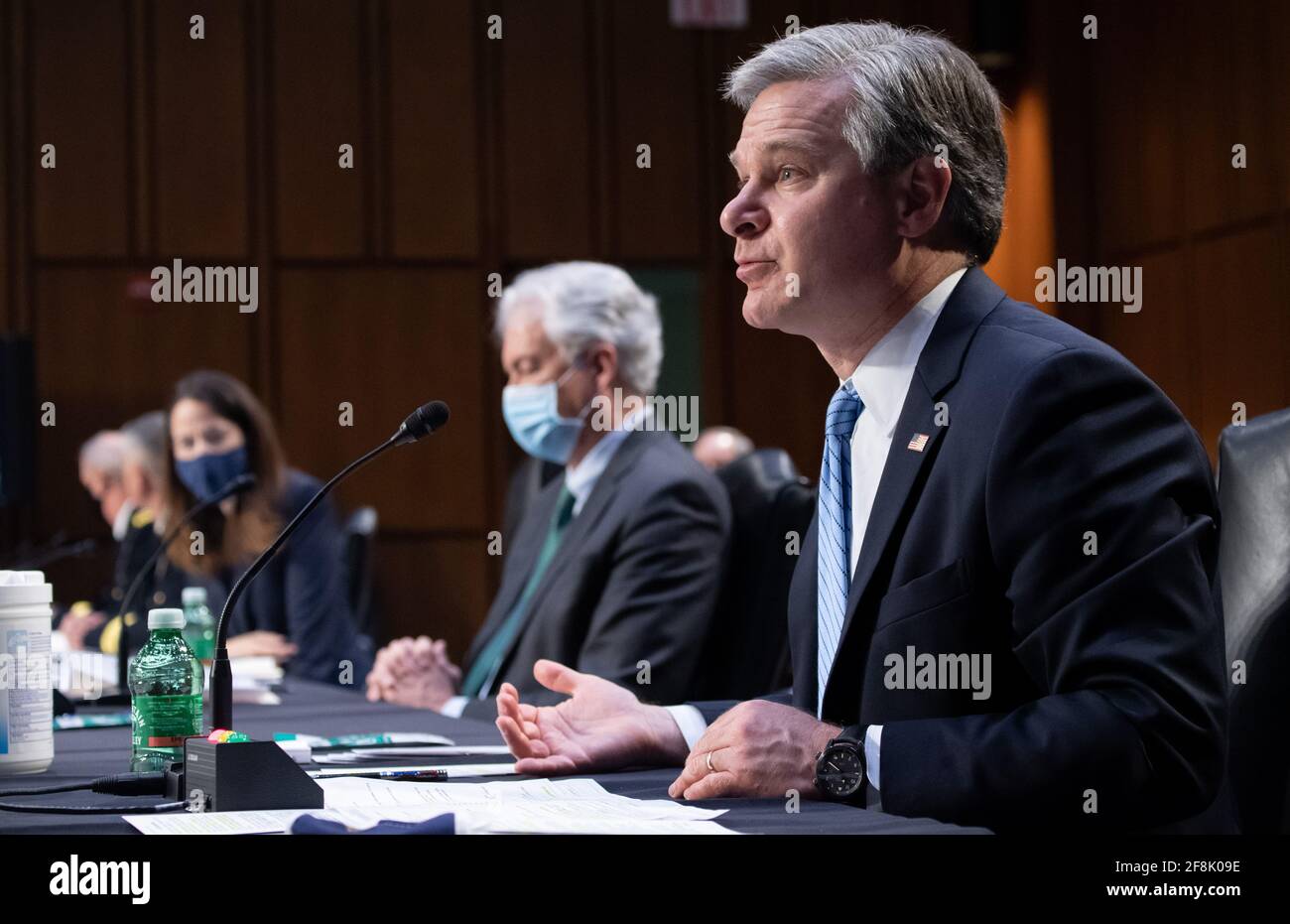 Christopher Wray (R), direttore dell'FBI, testimonia insieme al direttore della CIA William Burns (2° R), al direttore Avril Haines (2° L) dell'Ufficio del Direttore dell'intelligenza nazionale (ODNI), E il Direttore Generale dell'Agenzia Nazionale per la sicurezza (NSA) Paul Nakasone (L) durante un Comitato di selezione del Senato sull'audizione di intelligence sulle minacce mondiali, su Capitol Hill a Washington, DC, 14 aprile 2021.Credit: Saul Loeb/Pool via CNP /MediaPunch Foto Stock