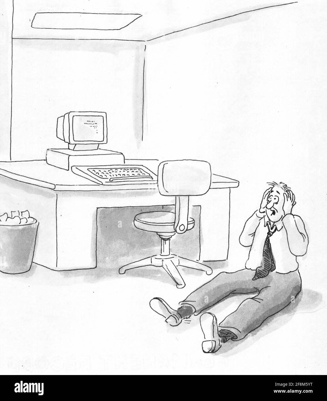 L'esecutivo si siede sul pavimento dall'attacco di ansia. Foto Stock