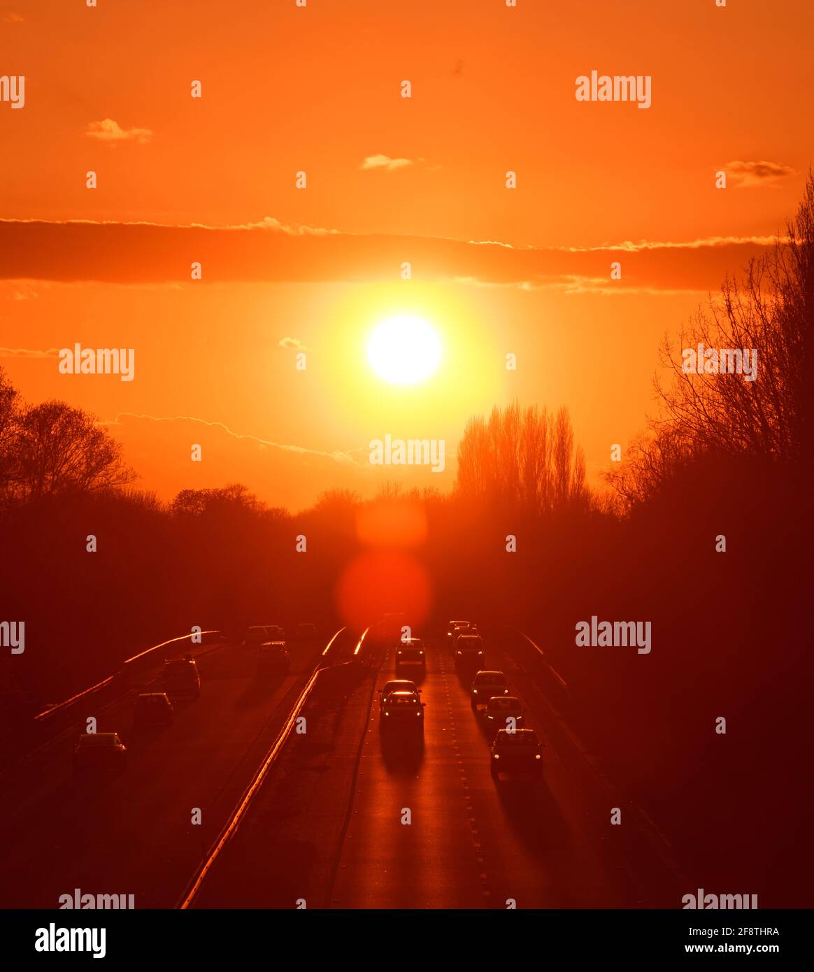 traffico viaggiando su strada al tramonto york yorkshire regno unito Foto Stock