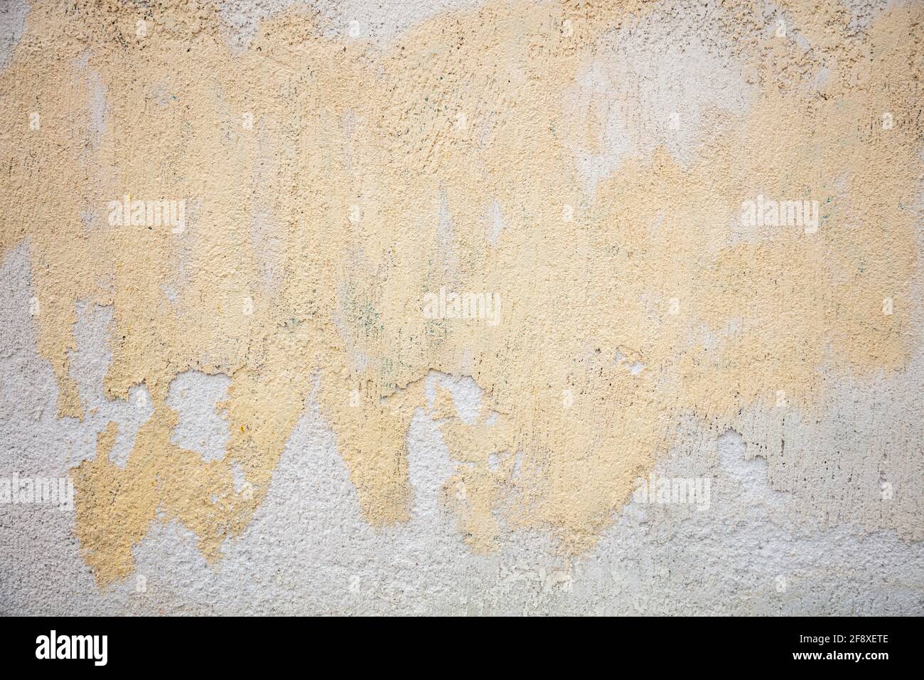 Sfondo della parete sbiadito, texture. Edificio dipinto materiale facciata Foto Stock