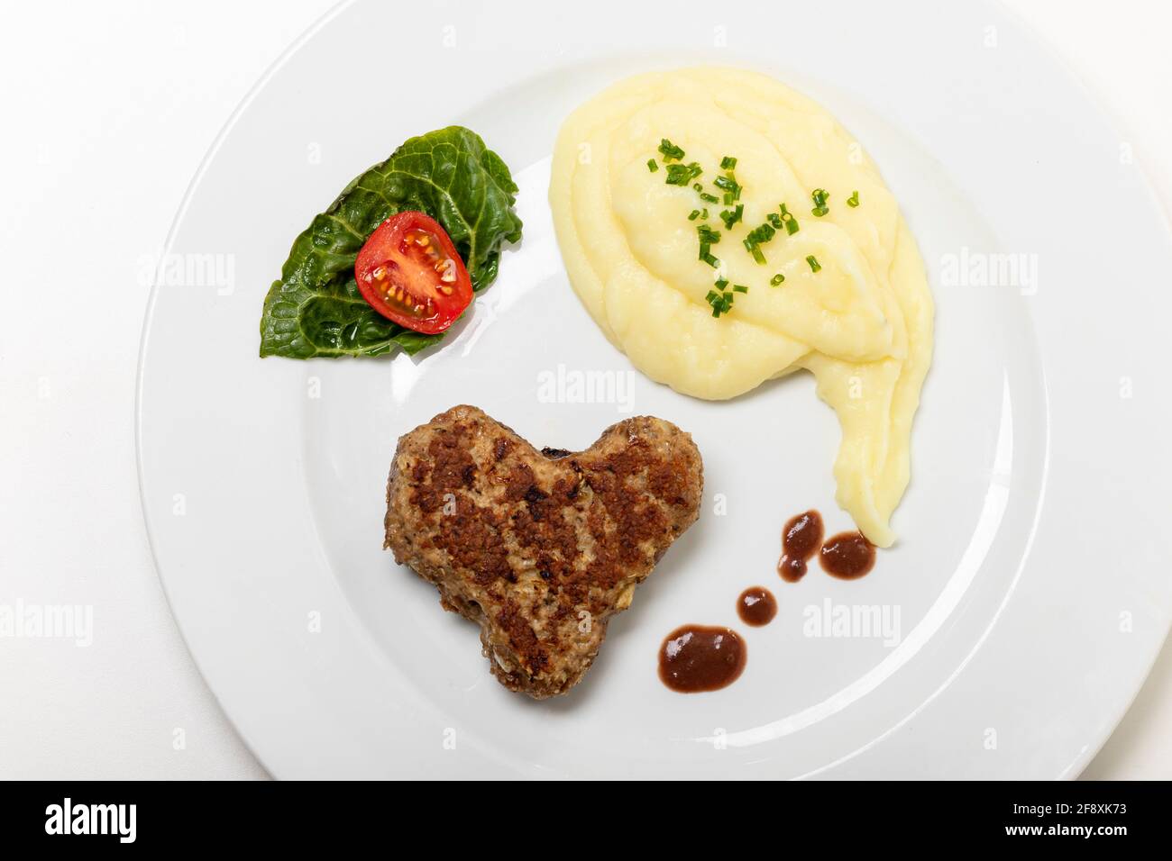Palla di carne a forma di cuore Foto Stock