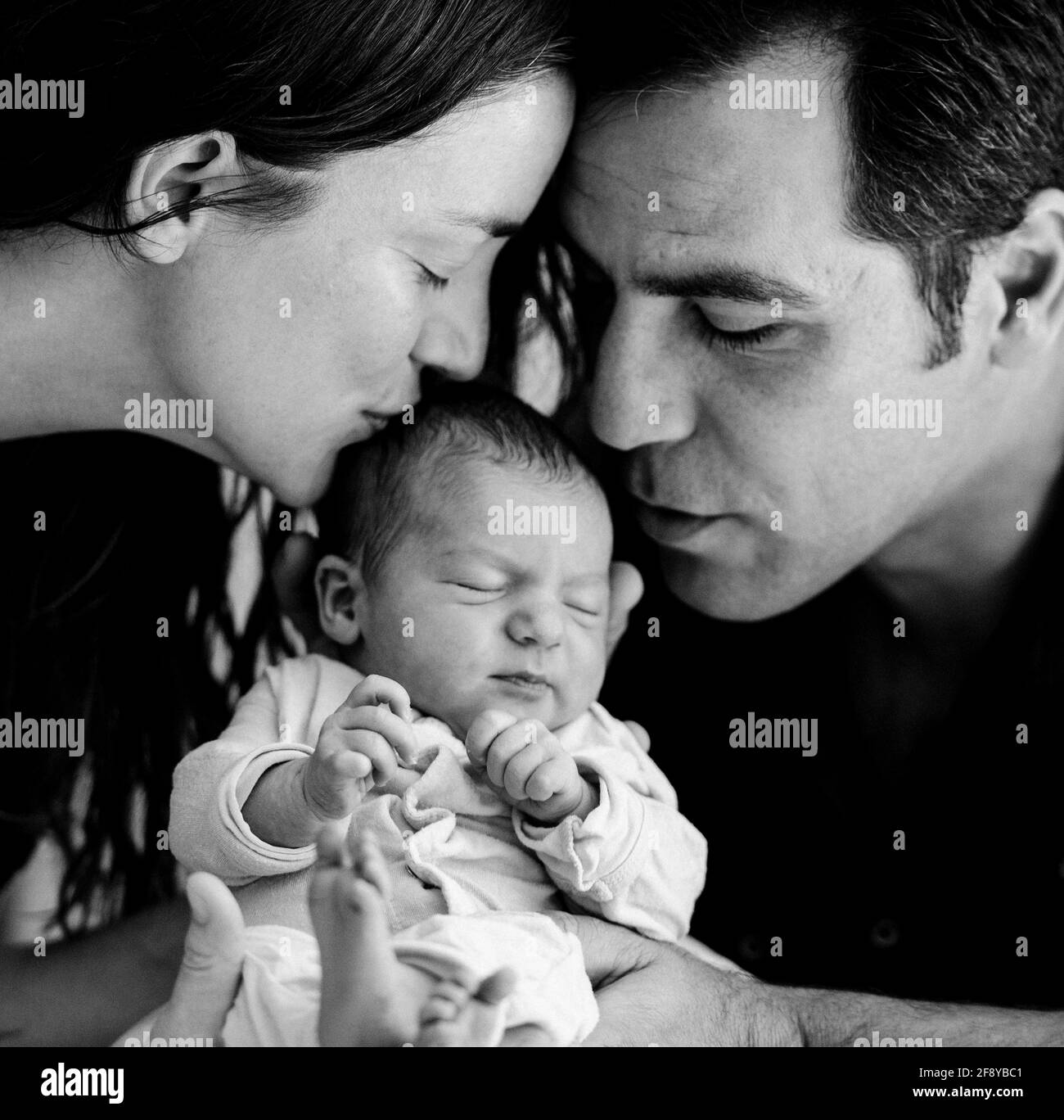 Ritratto dei genitori con neonato Foto Stock