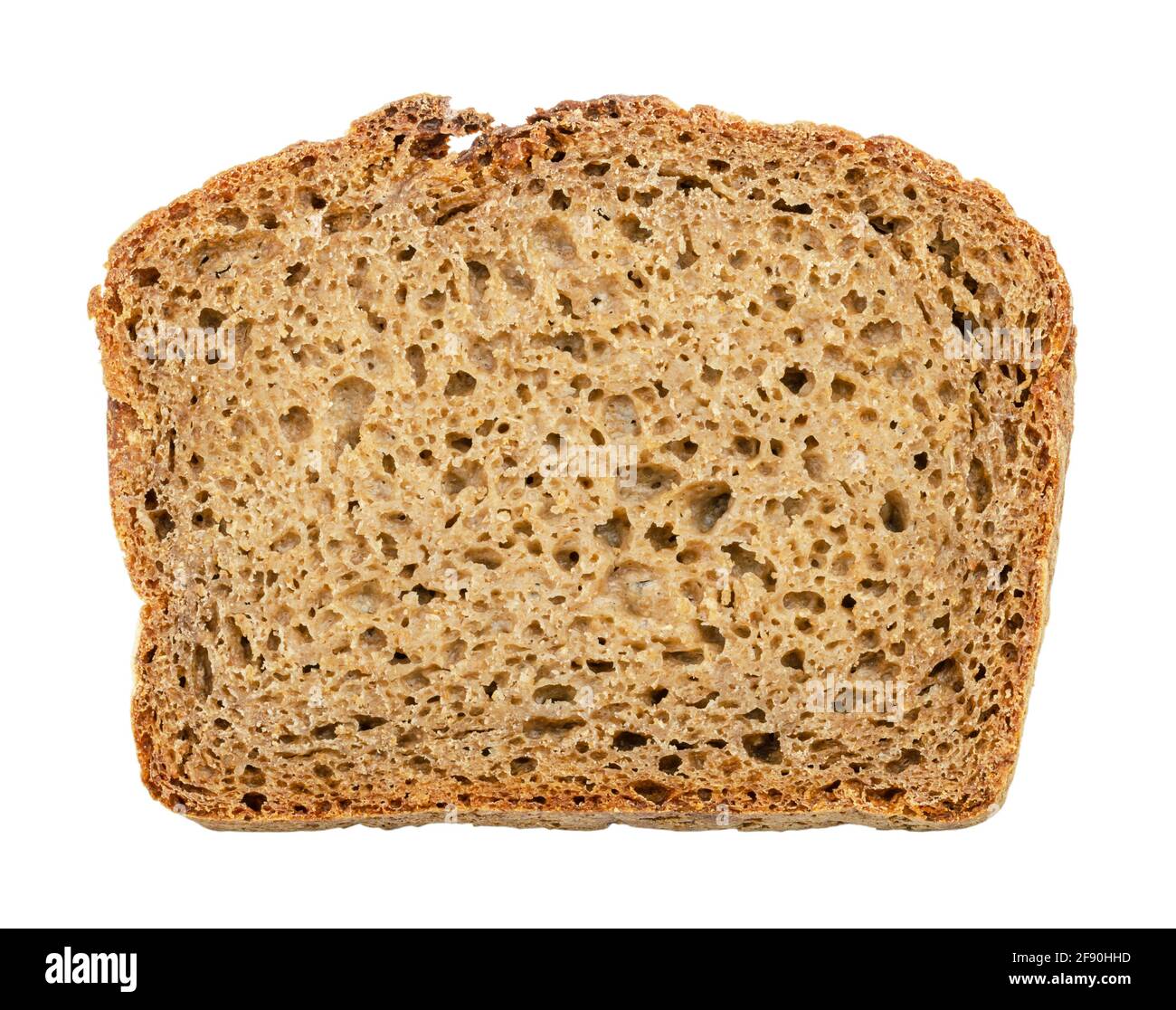 Fetta di pane fresco di segale scuro, dall'alto. Pane di pasta di colore marrone, un mix di farina di segala, lievito e spezie, crosta cotta al forno. Foto Stock