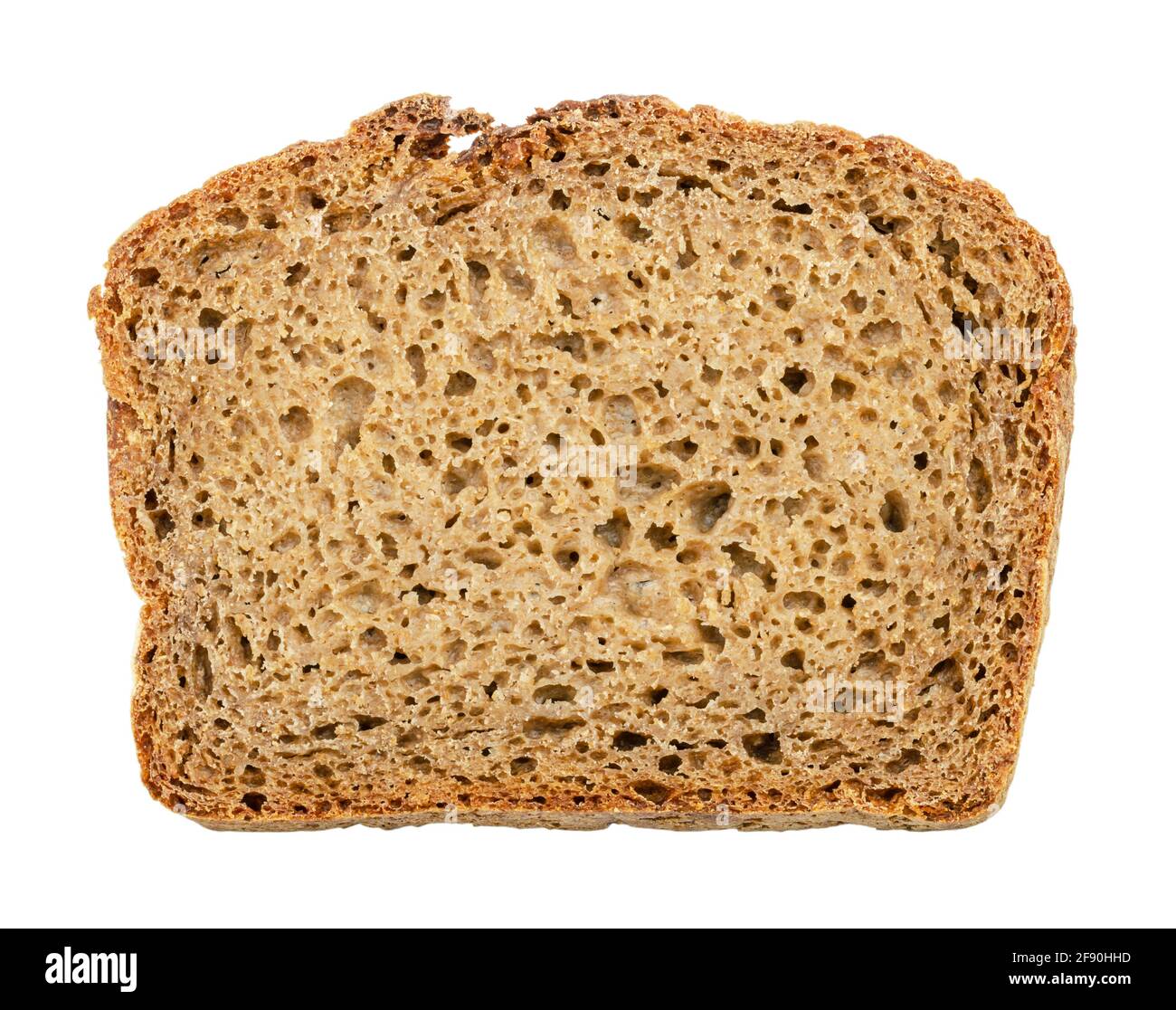 Fetta di pane fresco di segale scuro, dall'alto. Pane di pasta di colore marrone, un mix di farina di segala, lievito e spezie, crosta cotta al forno. Foto Stock