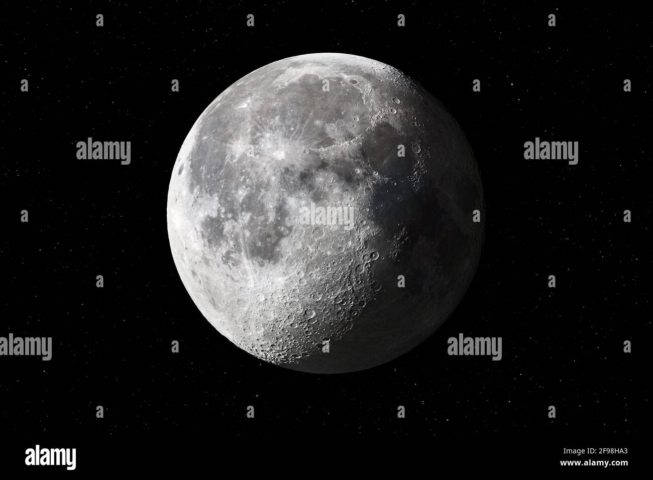 Luna in calo di tre quarti dal 7 ottobre 2020 con stelle sullo sfondo Foto Stock
