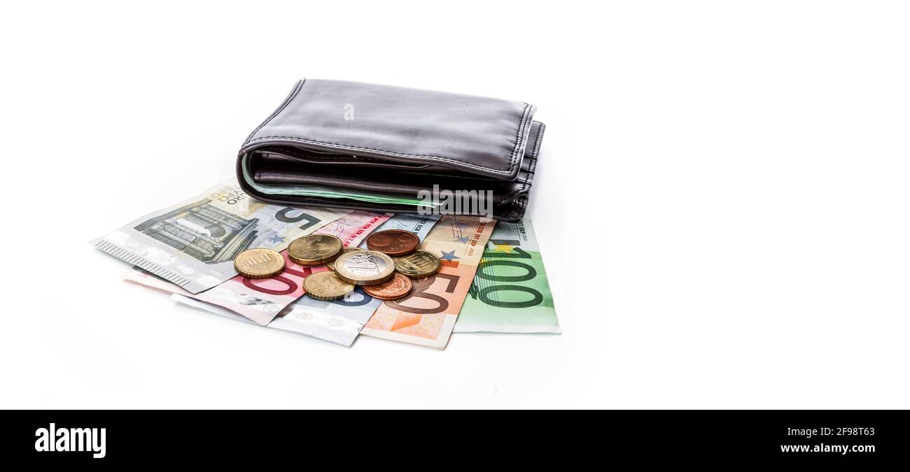 Euro in contanti con portafoglio su sfondo chiaro Foto Stock