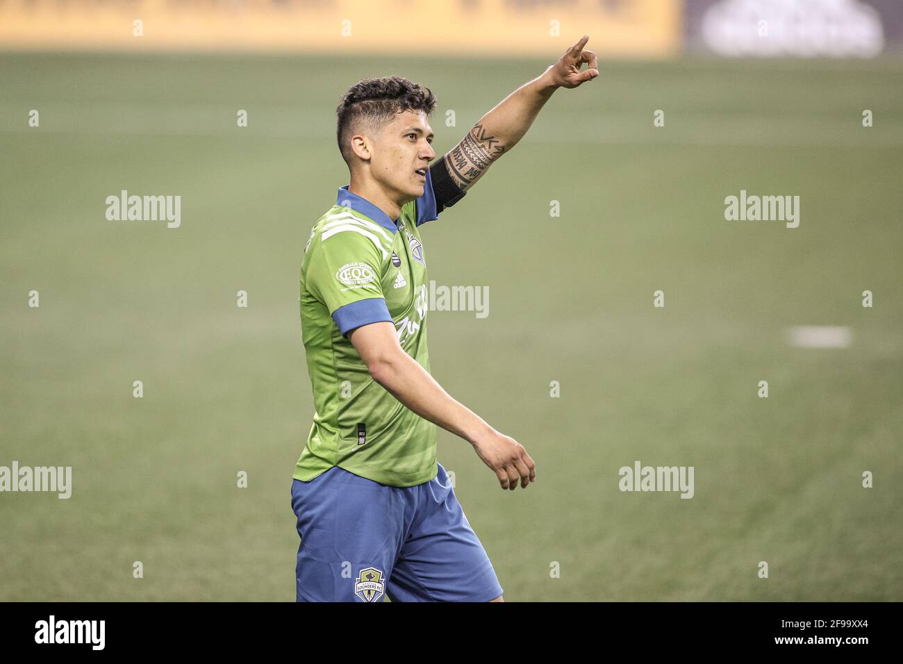 Seattle Sounders FC Forward Fredy Montero (12) reagisce al punteggio Un goal durante la seconda metà di una partita MLS Contro il Minnesota United FCat Lumen Foto Stock
