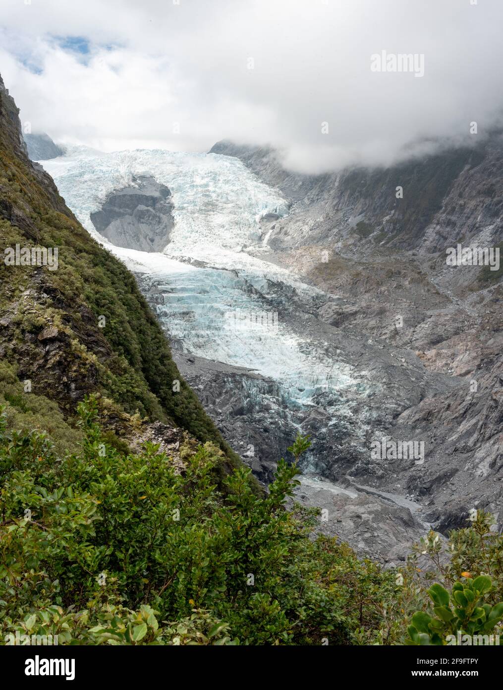 Bella giornata estiva al ghiacciaio Franz Josef, Nuova Zelanda Foto Stock