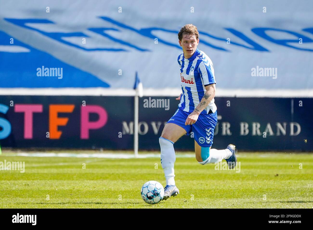 Odense, Danimarca. 18 Apr 2021. Ryan Johnson Laursen (4) di OB visto durante il 3F Superliga match tra Odense Boldklub e Sonderjyske al Nature Energy Park di Odense. (Photo Credit: Gonzales Photo/Alamy Live News Foto Stock