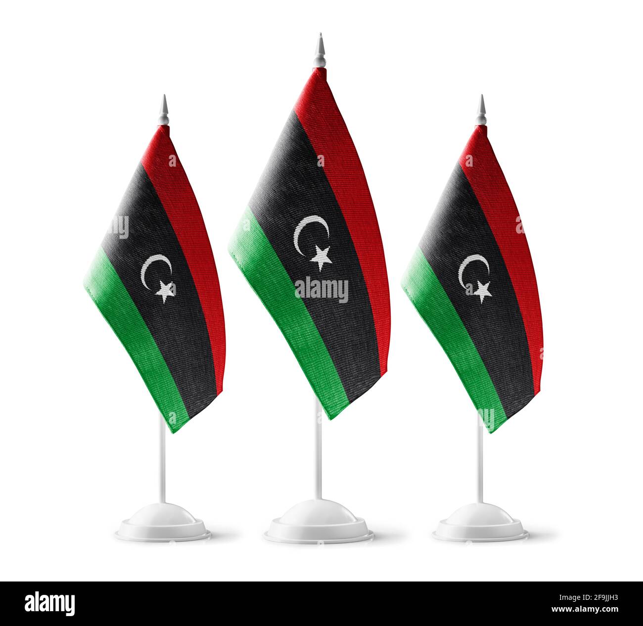 Piccole bandiere nazionali della Libia su sfondo bianco Foto Stock