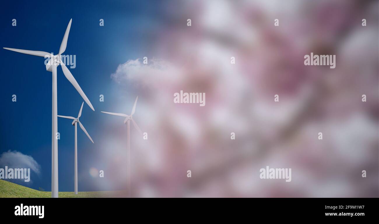 Composizione di turbine eoliche in campagna con fiori rosa Foto Stock