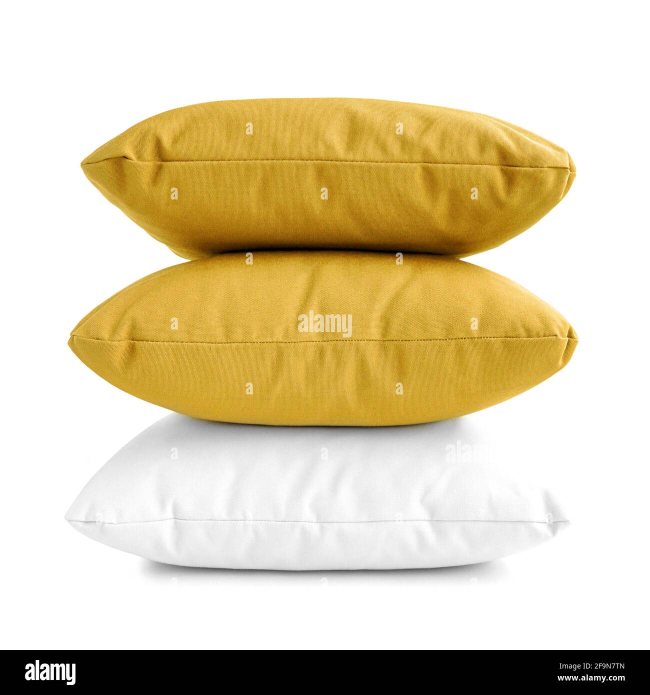 Cuscini - pila di tre cuscini su sfondo bianco Foto Stock