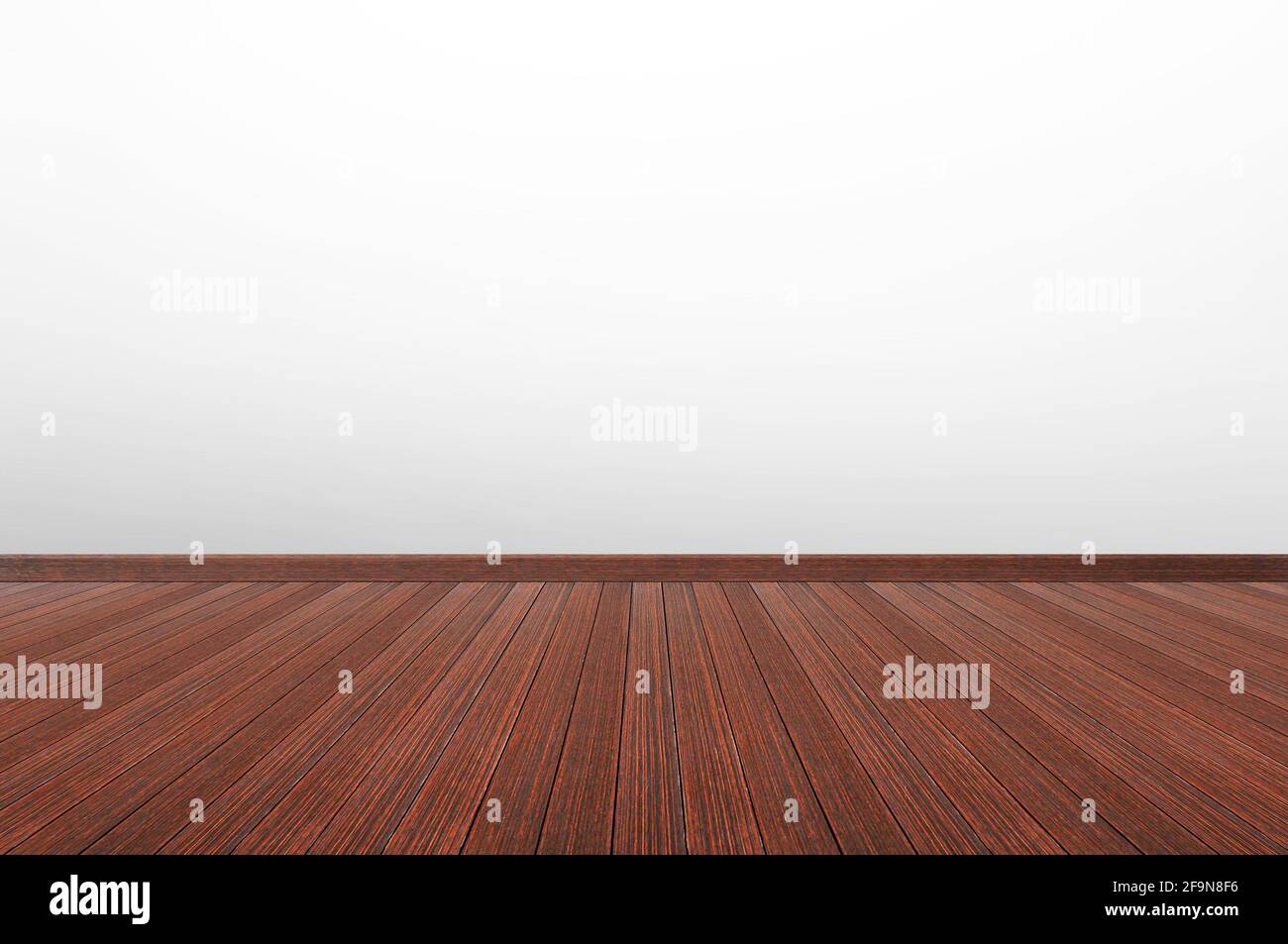 Pavimento in legno e parete bianca grigia come sfondo vuoto della stanza Foto Stock