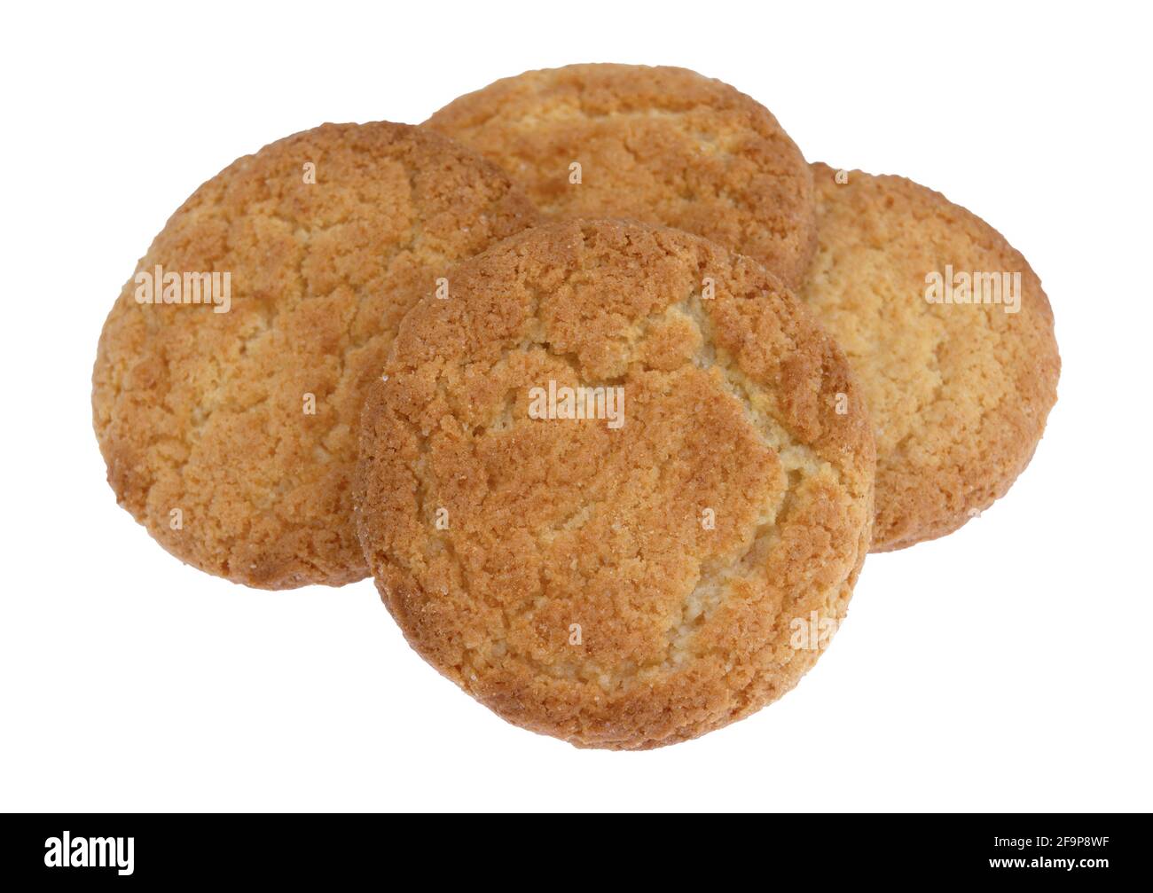 Quattro biscotti al gusto di cocco disposti e isolati su sfondo bianco. Foto Stock