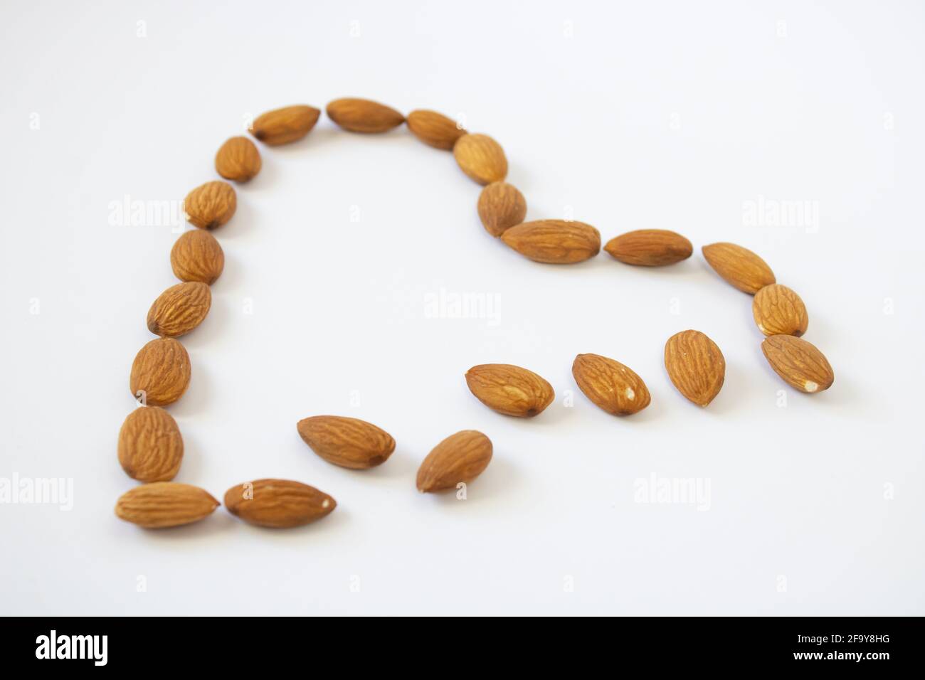 Cuore di mandorle - amore di salute. Foto Stock