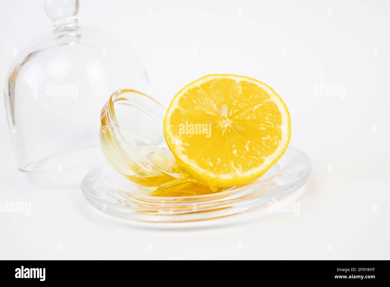 Miele e limone. Una combinazione di dolce e agrodolce. Cibo di salute. Foto Stock