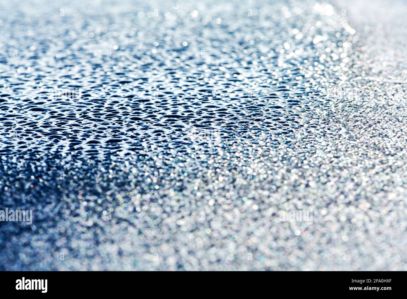 texture gocce d'acqua congelate metà, gradiente grigio Foto Stock