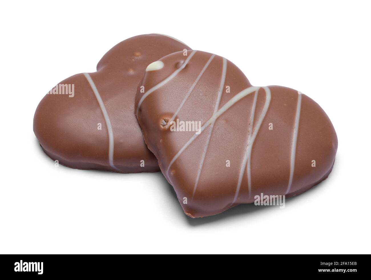 Due biscotti Shortbread immersi al cioccolato a forma di cuore che si cuota fuori. Foto Stock