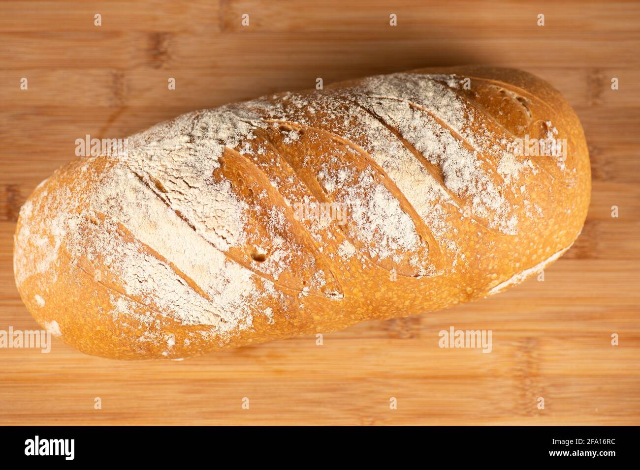Primo piano dettagliato di una pagnotta di pane di Casa. Foto Stock