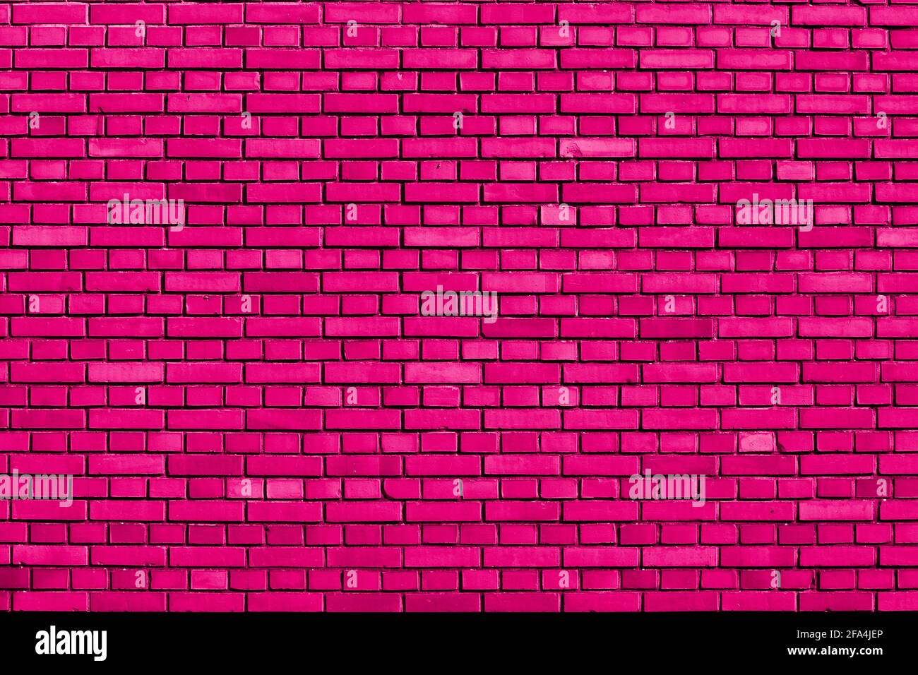 sfondo muro di mattoni di colore rosa Foto Stock