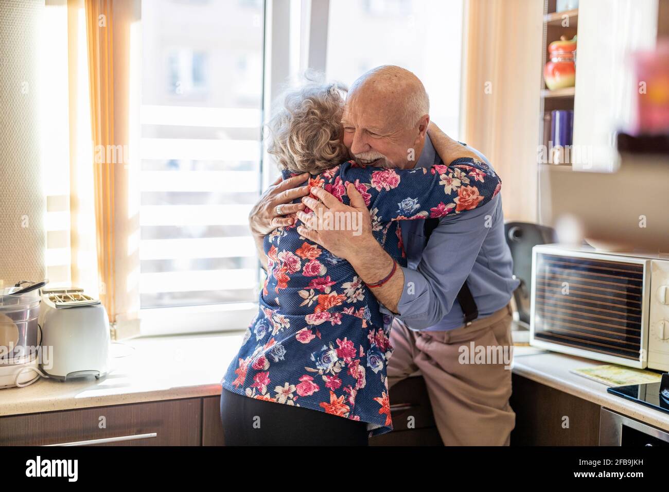 Felice coppia senior insieme a casa Foto Stock
