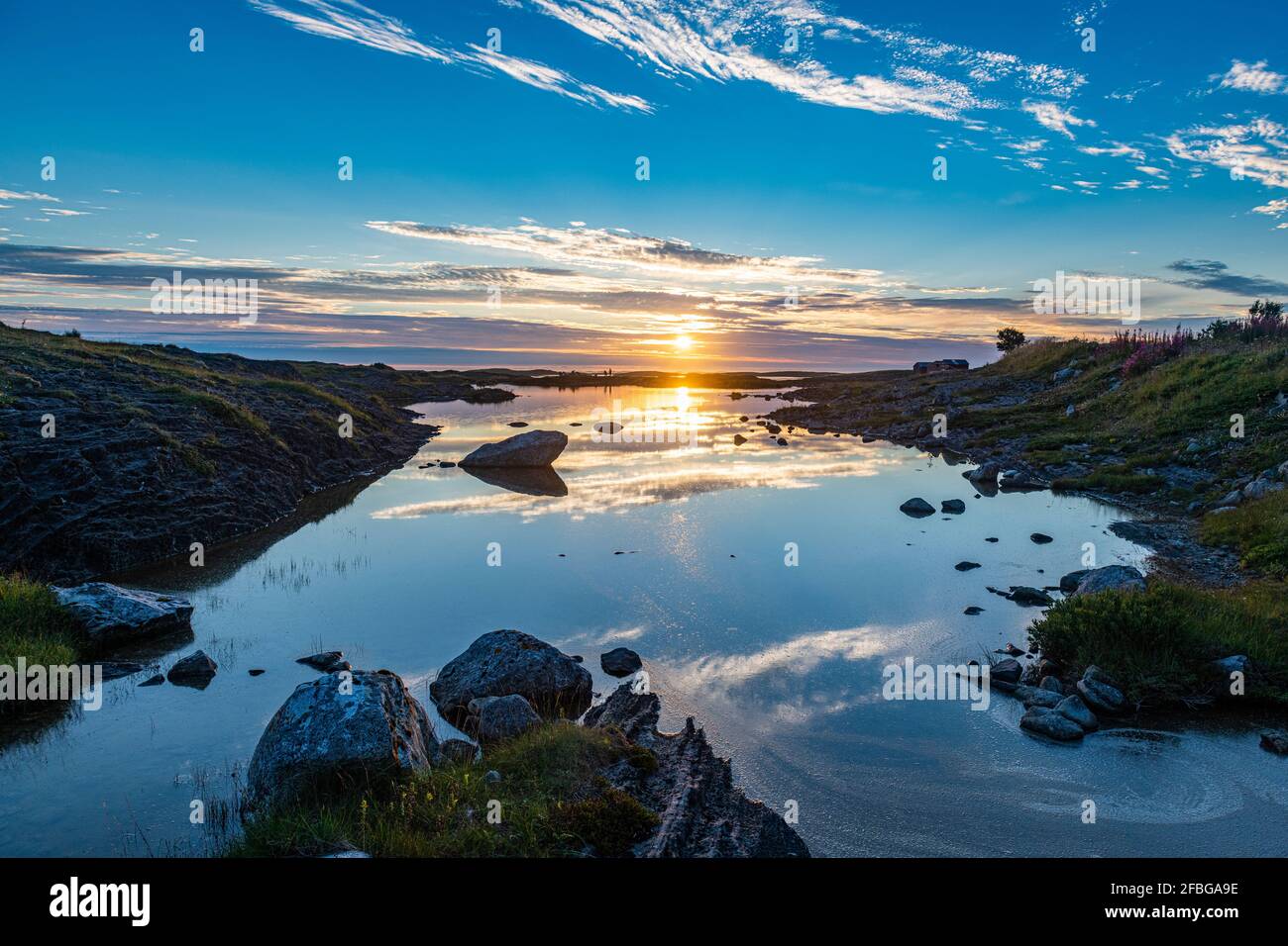 Norvegia, Arcipelago di Vega, Tramonto sul sito patrimonio mondiale dell'UNESCO Foto Stock