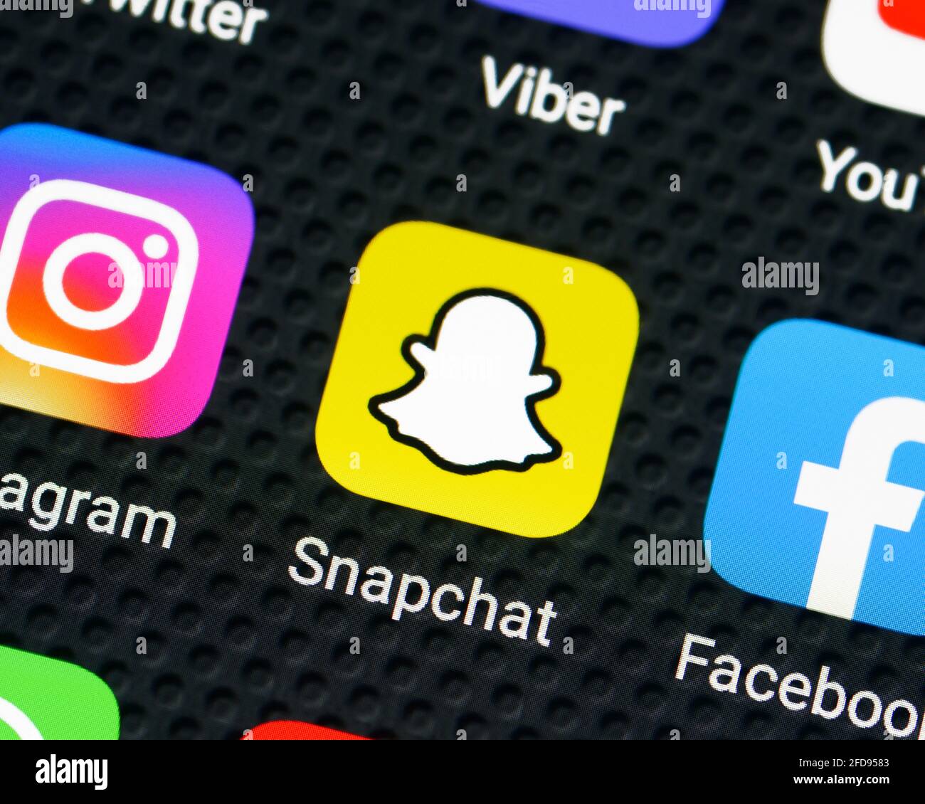 Icona dell'applicazione Snapchat su uno smartphone, primo piano Foto Stock