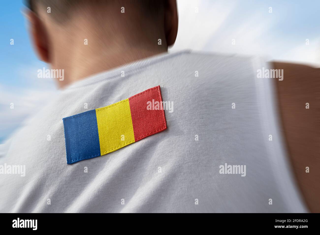 Bandiera nazionale della Romania sulla schiena dell'atleta Foto Stock
