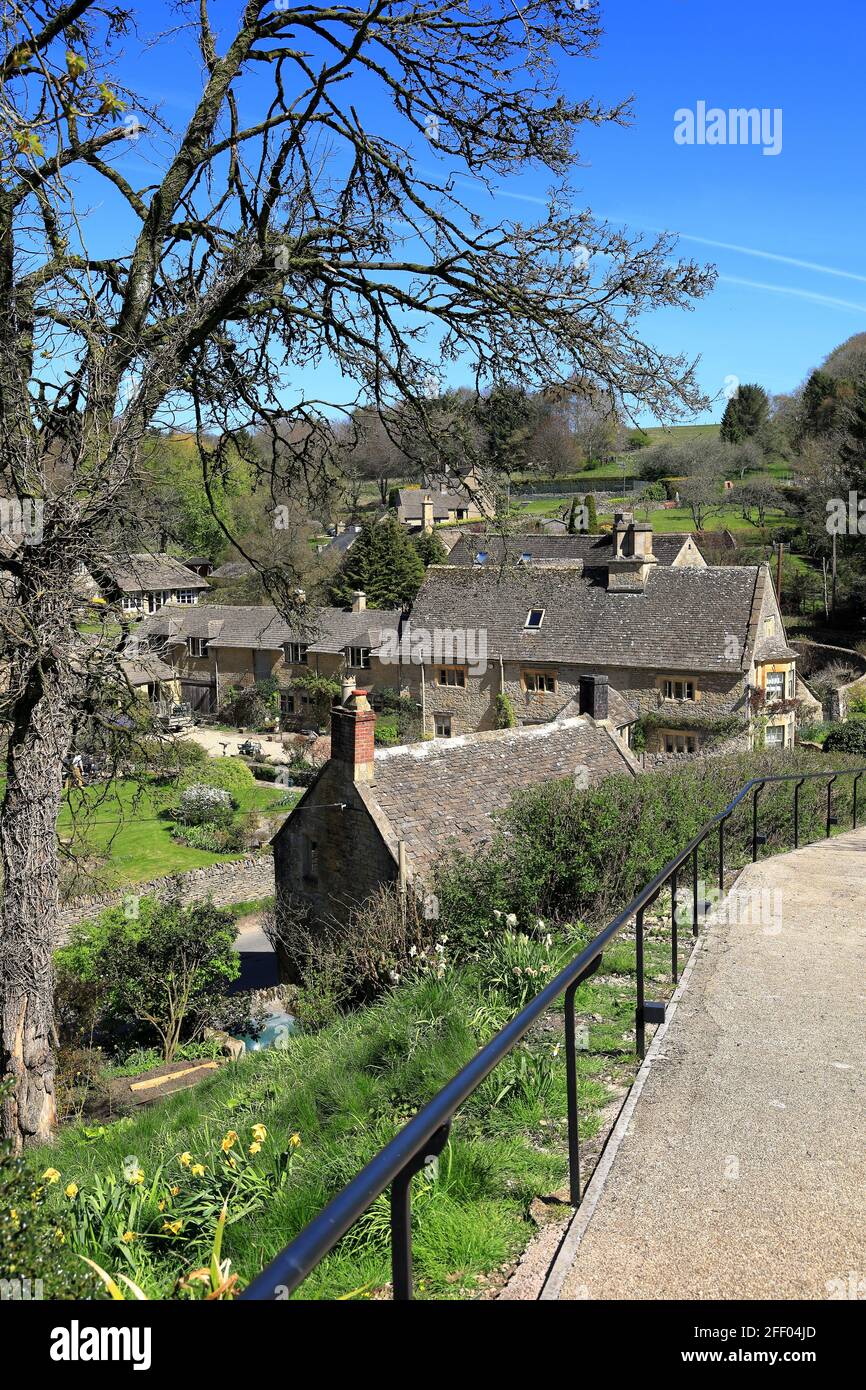 Il Cotswolds - le case di pietra di Cotswold a Compton Abdale, un piccolo villaggio nel Gloucestershire. Foto Stock