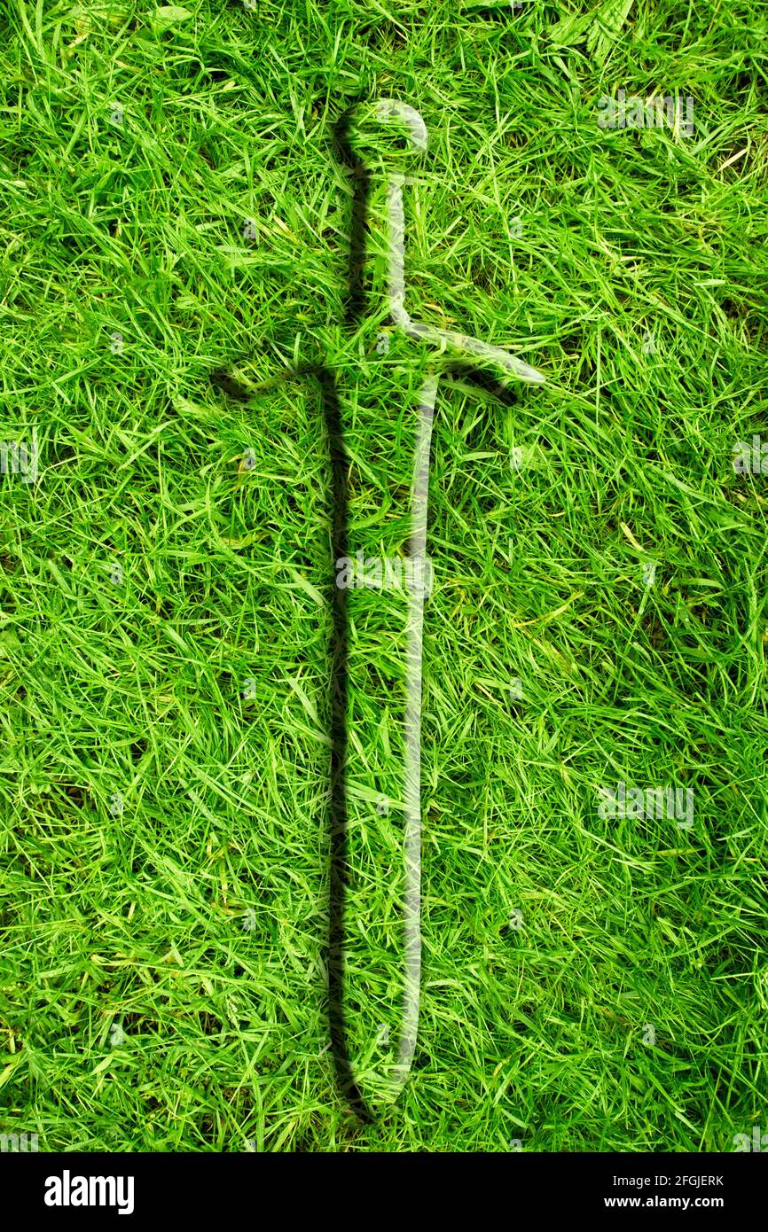 spada medievale e composito d'erba Foto Stock