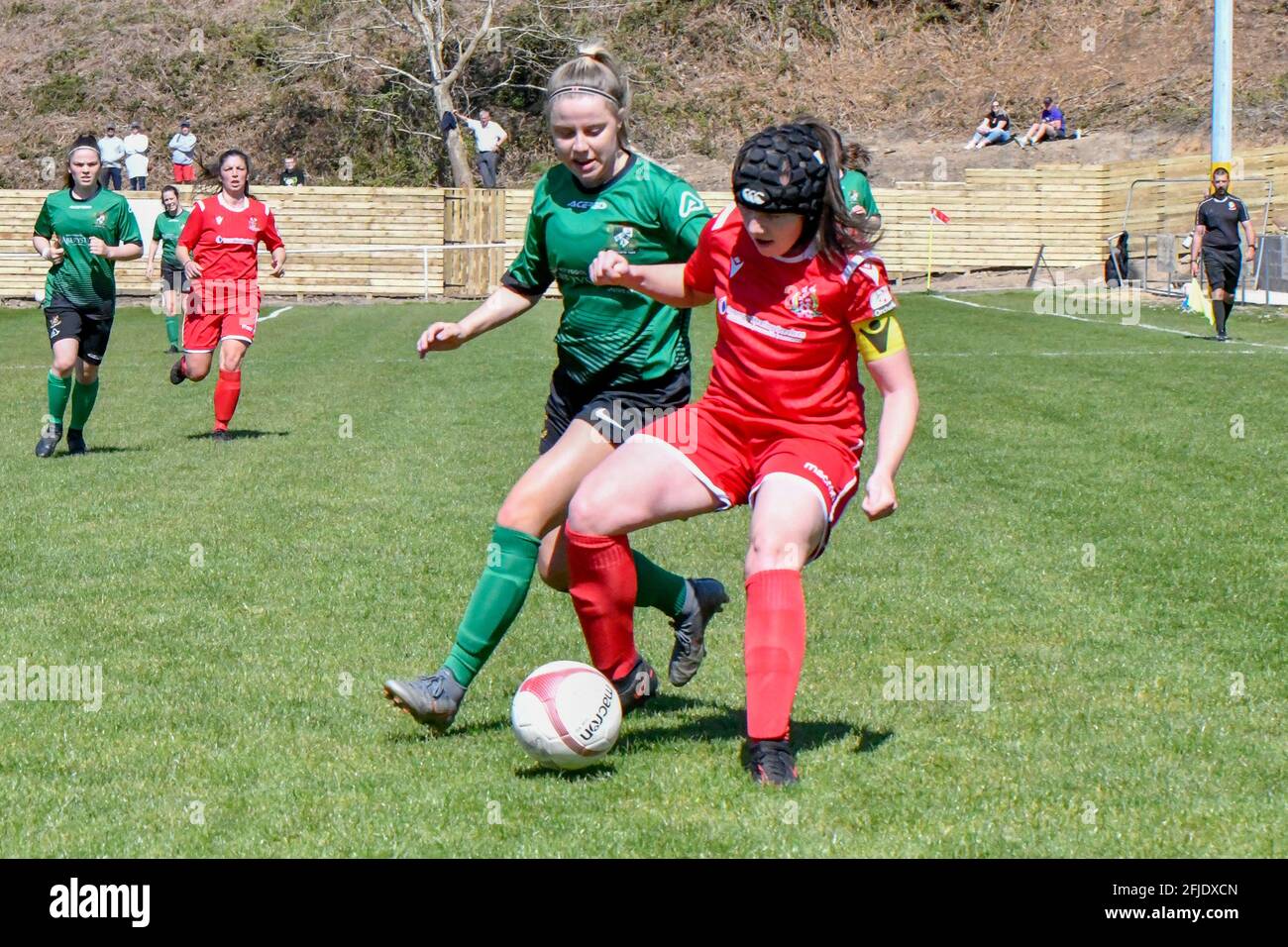 Briton Ferry, Galles. 25 aprile 2021. Captain Lowri Ridings of Briton Ferry Llansawel Ladies scudi la palla da Hannah Pusey of Aberystwyth Town Ladies durante la partita di Orchard Welsh Premier Women's League tra Briton Ferry Llansawel Ladies e Aberystwyth Town Ladies al Old Road Welfare Ground a Briton Ferry, Galles, Regno Unito, il 25 aprile 2021. Credit: Duncan Thomas/Majestic Media/Alamy Live News. Foto Stock Briton Ferry, Galles. 25 aprile 2021. Captain Lowri Ridings of Briton Ferry Llansawel Ladies scudi la palla da Hannah Pusey of Aberystwyth Town Ladies durante la partita di Orchard Welsh Premier Women's League tra Briton Ferry Llansawel Ladies e Aberystwyth Town Ladies al Old Road Welfare Ground a Briton Ferry, Galles, Regno Unito, il 25 aprile 2021. Credit: Duncan Thomas/Majestic Media/Alamy Live News. Foto Stock