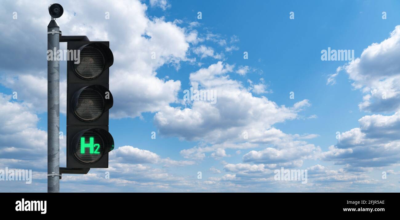 Semaforo con simbolo H2. Ottenere idrogeno verde da fonti energetiche rinnovabili. Concetto Foto Stock