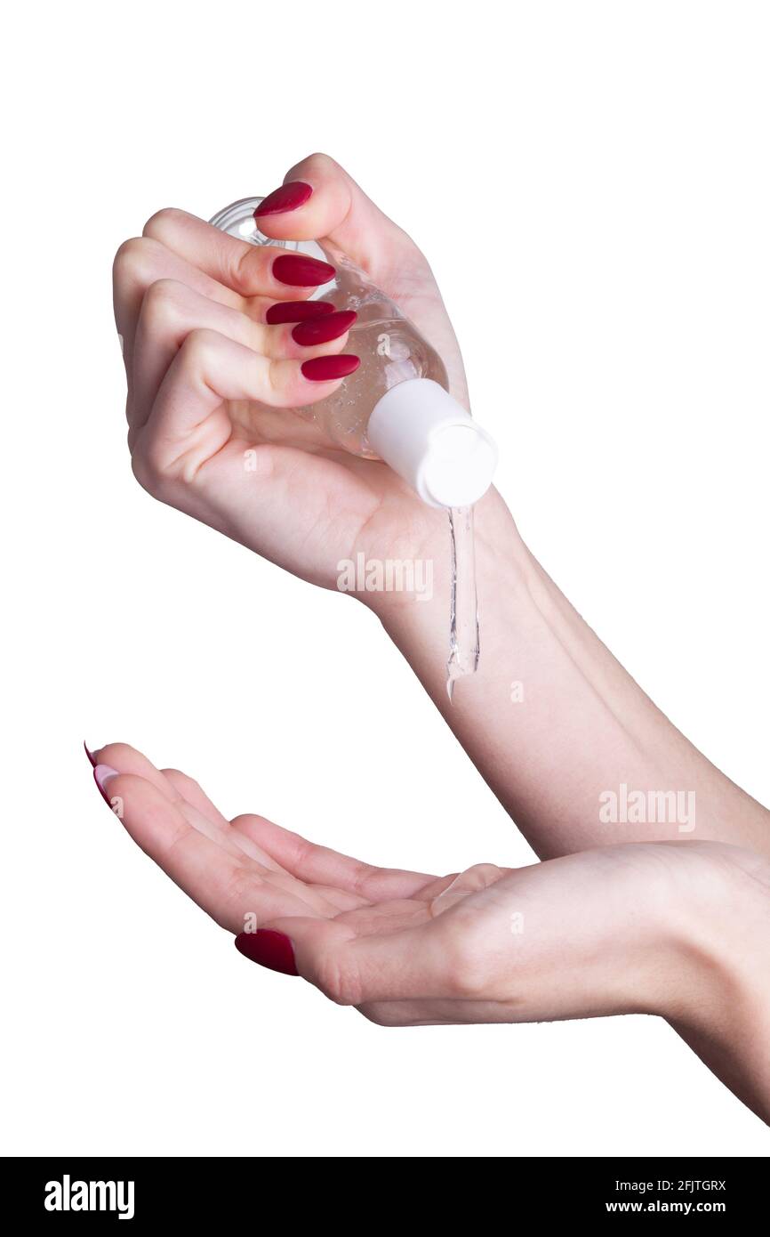 Donna che applica un gel antisettico antibatterico per la disinfezione delle mani e la protezione della salute durante l'epidemia di virus influenzale. Coronavirus quarantena e nove Foto Stock