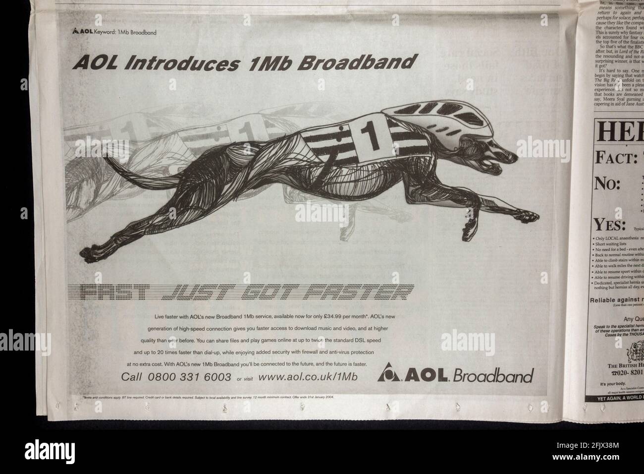 Annuncio per AOL Broadband internet (promuovendo il loro nuovo servizio 1MB) all'interno del giornale Times UK il 15 dicembre 2003. Foto Stock
