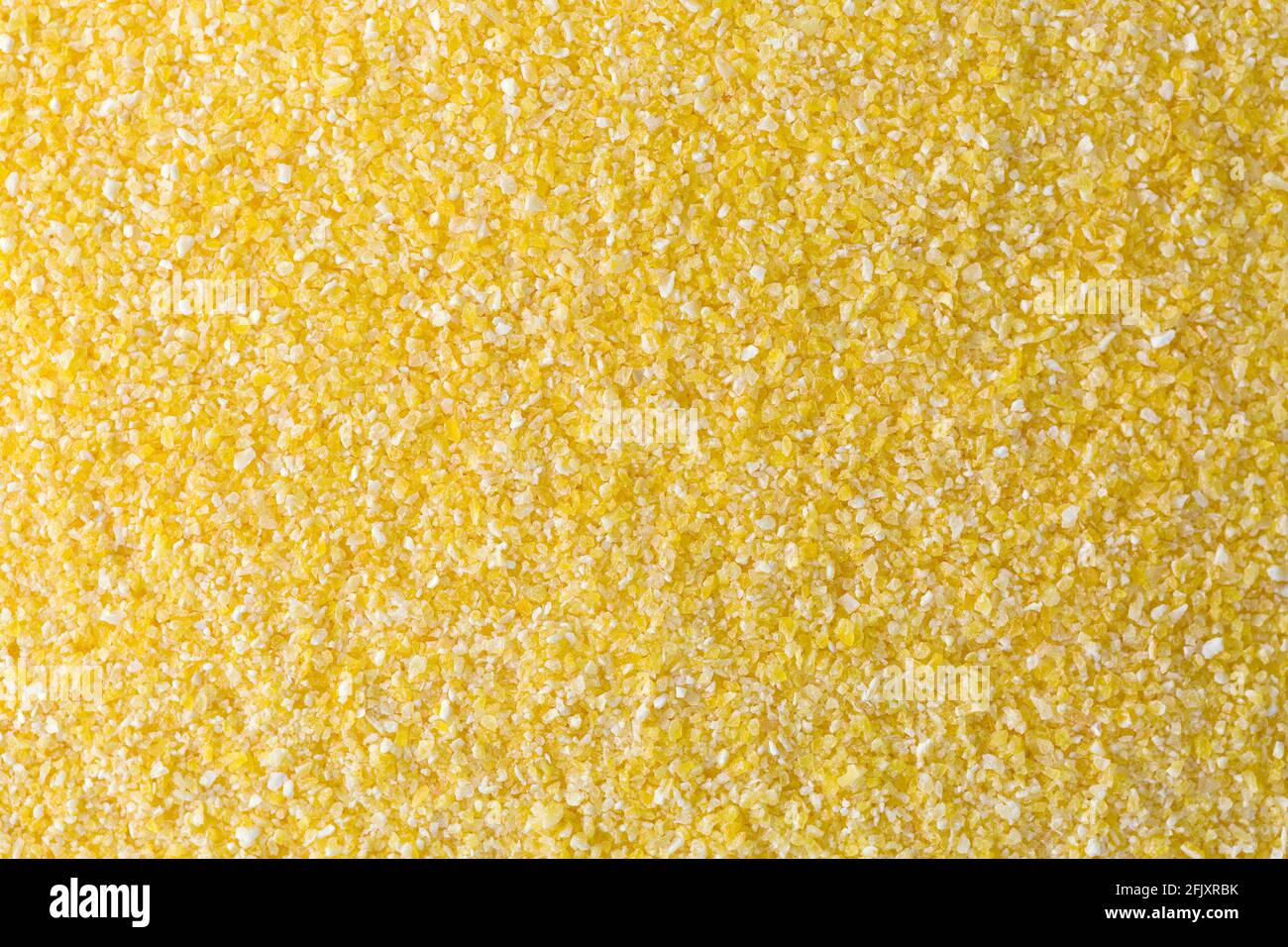 Consistenza di polenta, farina di farina di mais gialla, semola, chiocciolamento di cereali a cottura rapida Foto Stock