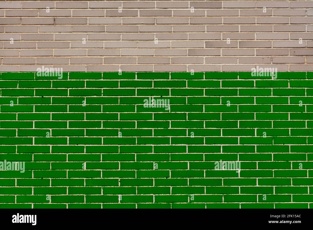 Muro di mattoni grigio e verde. Con spazio di copia da utilizzare come sfondo o disegni. Simbolismo. Colore del nastro per la giornata di sensibilizzazione Foto Stock